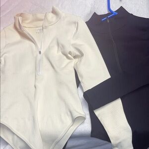 Cream and Black Ribbed Zip-Up Bodysuits